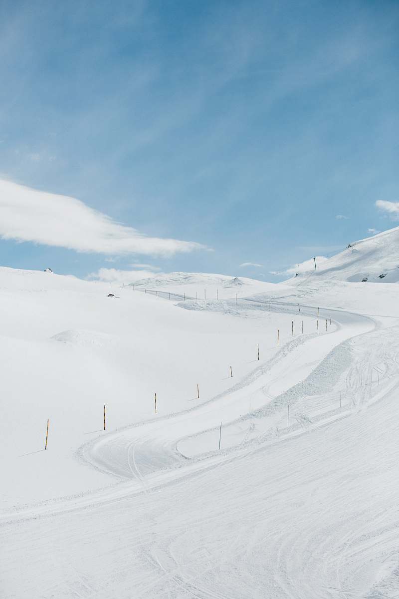 nature snowfield under clear blue sky outdoors