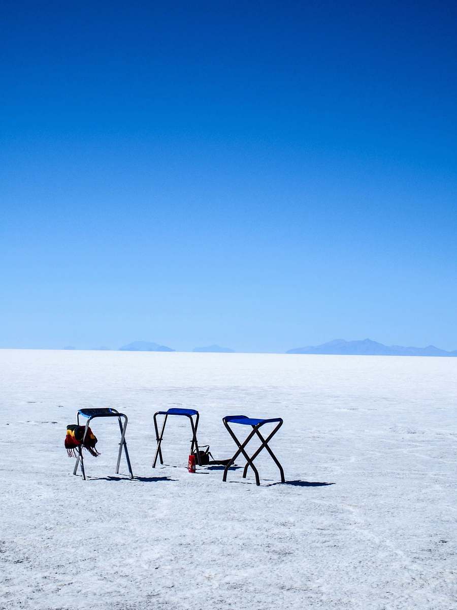 furniture three blue-and-gray folding camping chairs on ground chair
