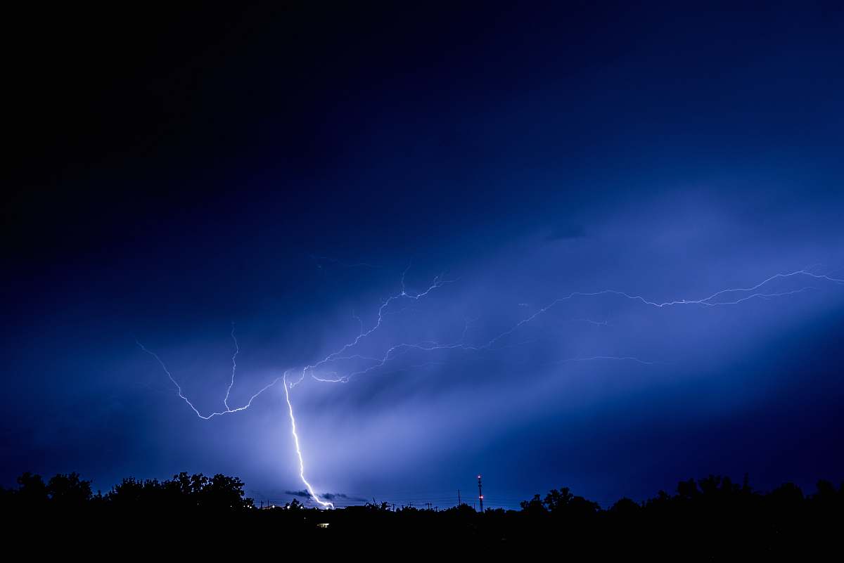 lightning thunder light strike on forest thunderstorm