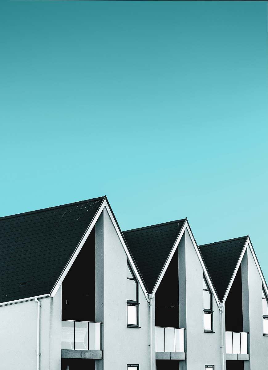 building white and black building during daytime house