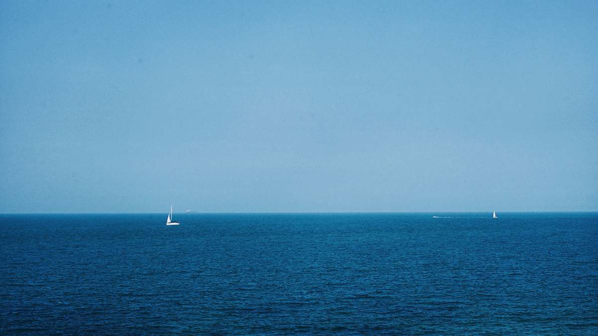 boat white boat on calm ocean transportation