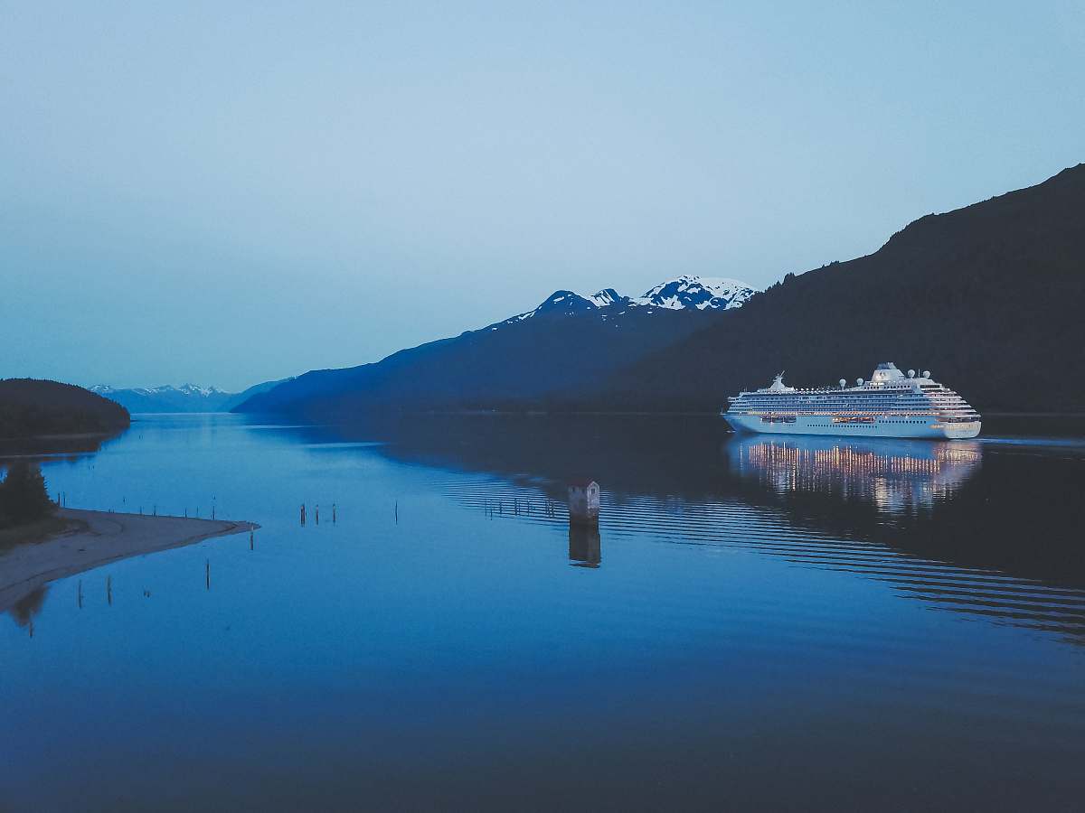 boat white cruise ship on body of water ship