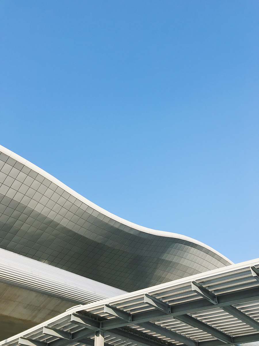 architecture white high-rise building under blue sky building