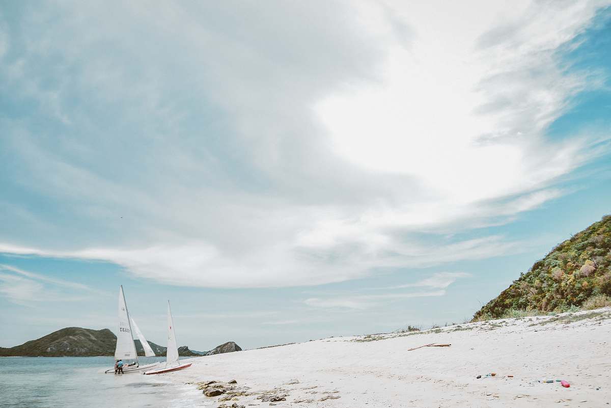 transportation white sailboat on seashore vehicle