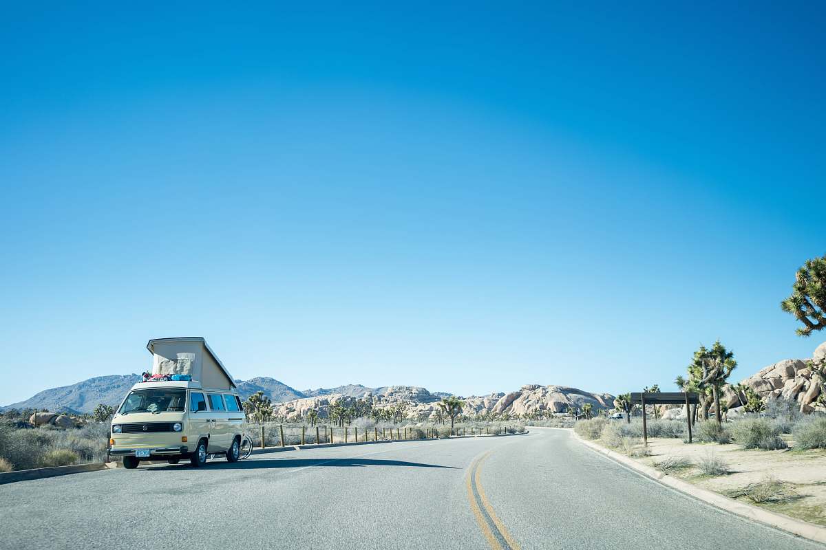 van white van on road during daytime vehicle