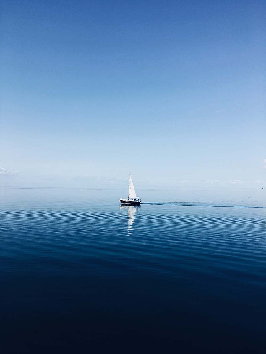 vehicle white sailboat at middle of ocean transportation
