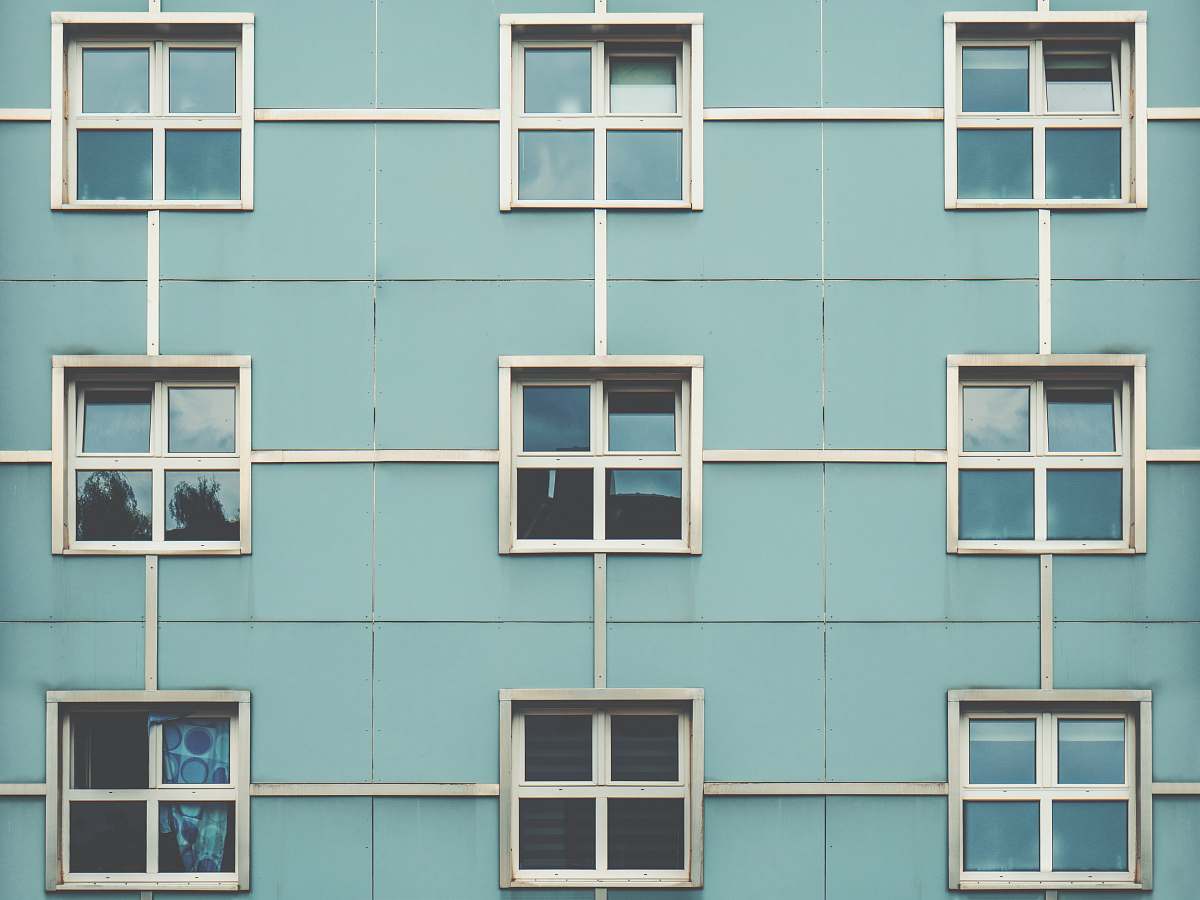 window photo of gray concrete building cologne