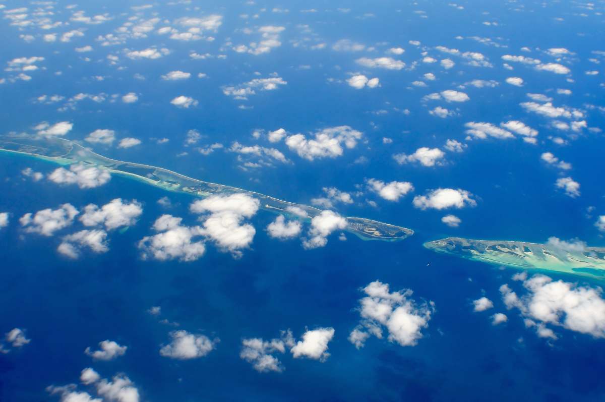 cloud aerial photography of green island and clouds clouds