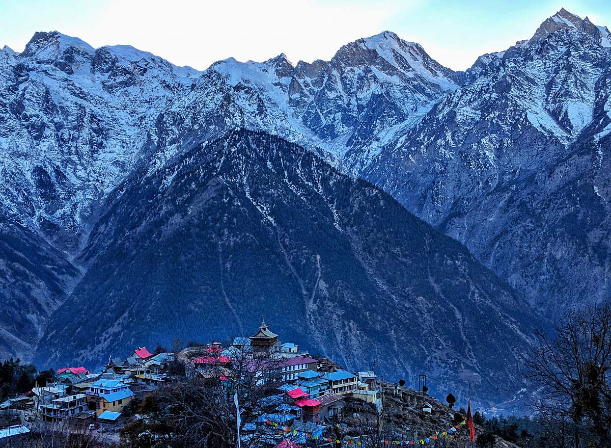 nature village surrounded by mountains outdoors