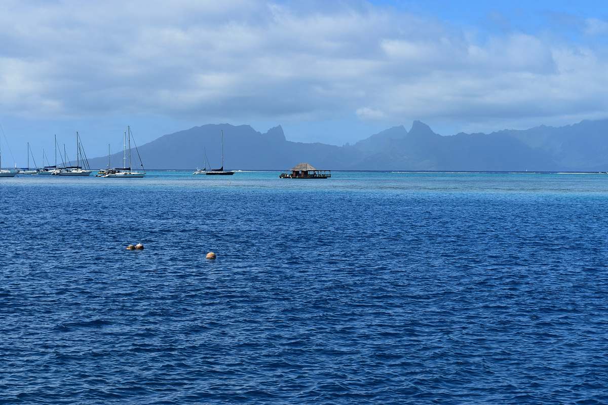 outdoors blue sea under white ksy land