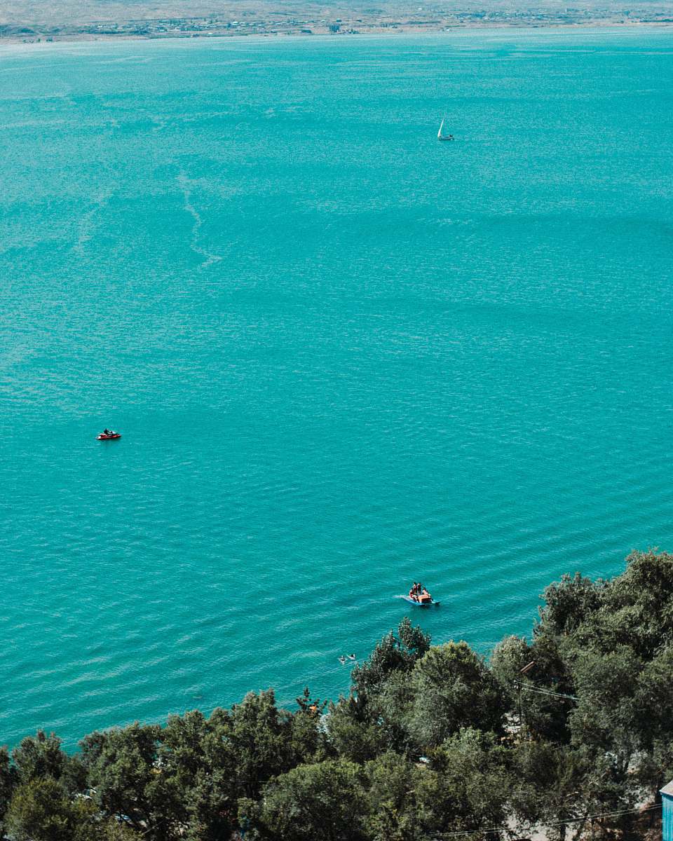 outdoors boats on water near shore ocean
