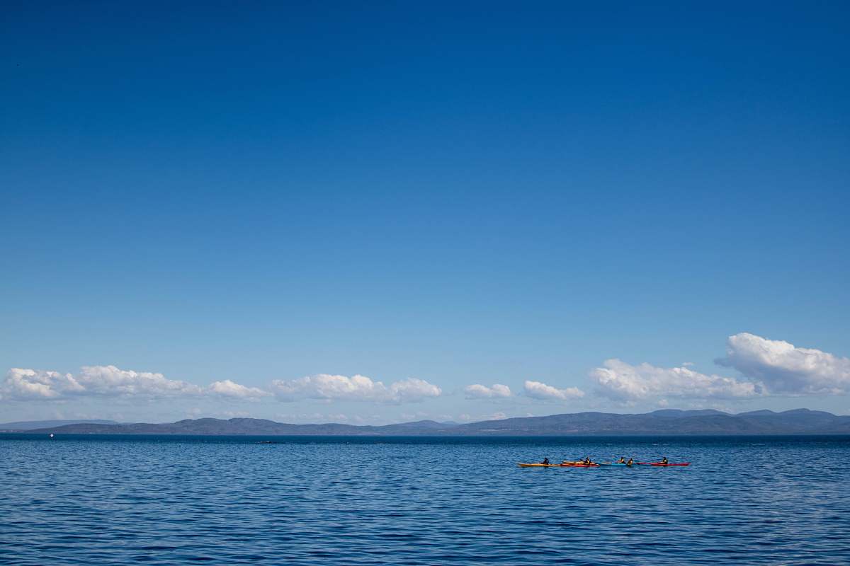 outdoors calm sea water during cloudy day blue