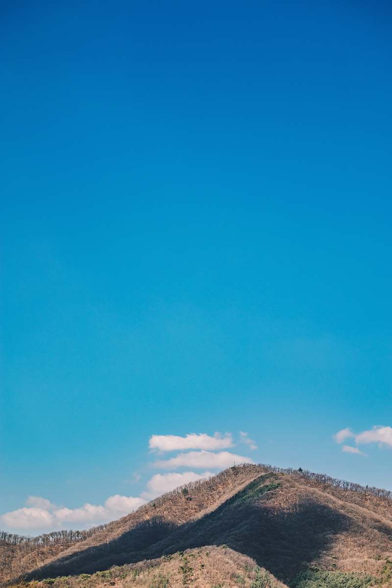 blue landscape photography of mountains outdoors