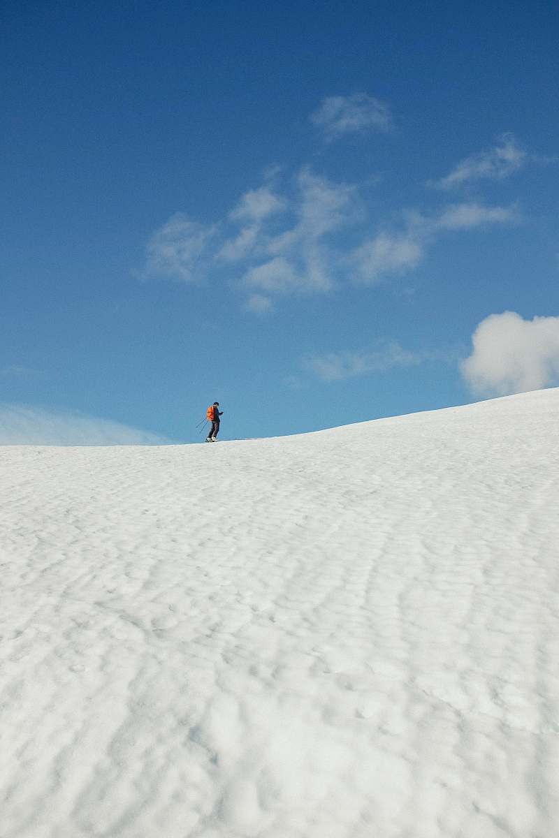 soil person standing on white sand sand