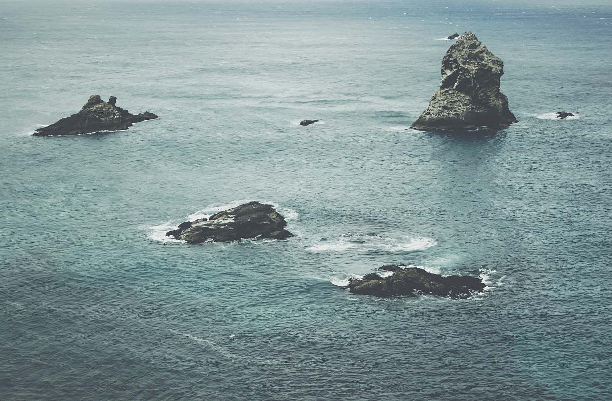 grey aerial view of body of water water