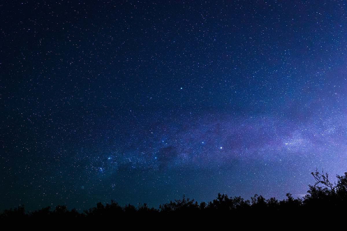 blue milky way visible in dark night sky nature
