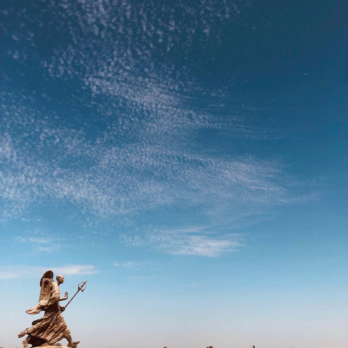 blue person holding stick walking human