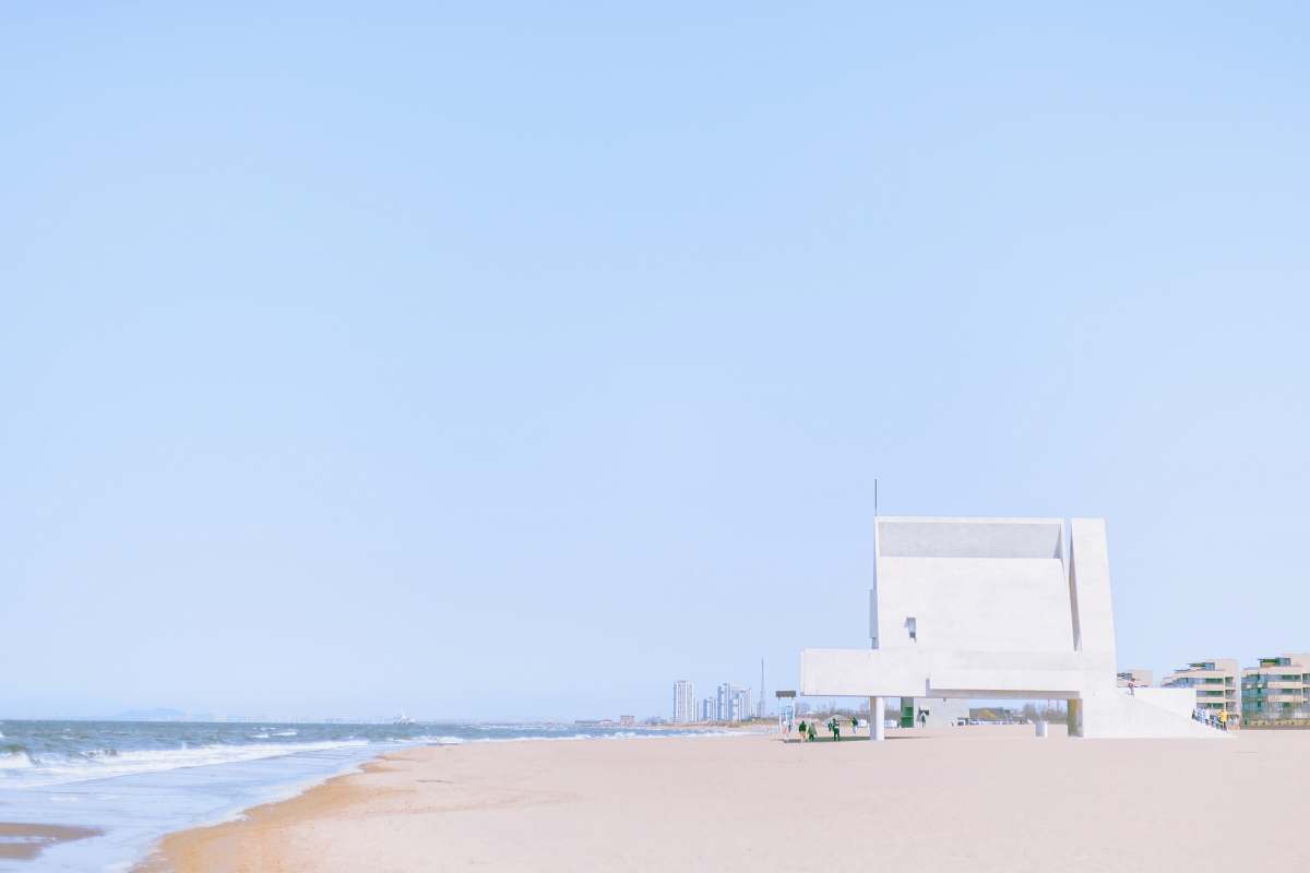 blue white building by the sea nature