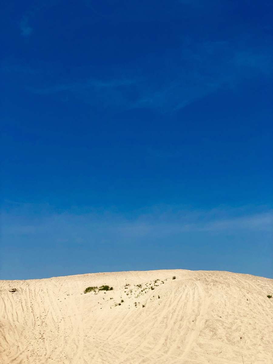 nature white mountain under blue sky close-up photography soil