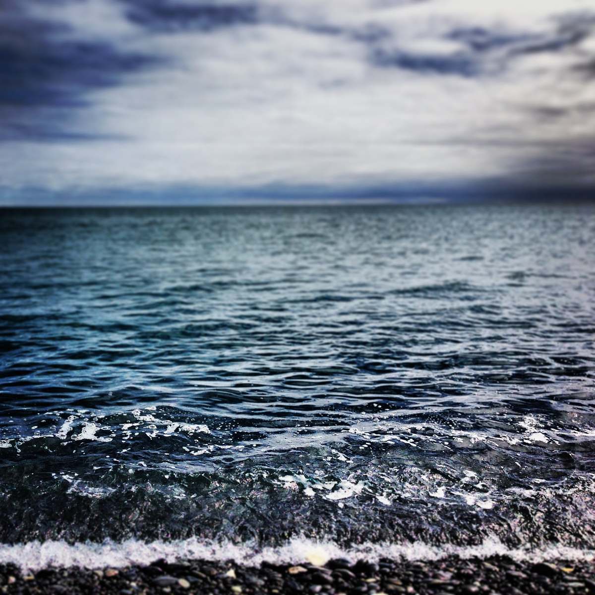 water close up photography of calm body of water waves