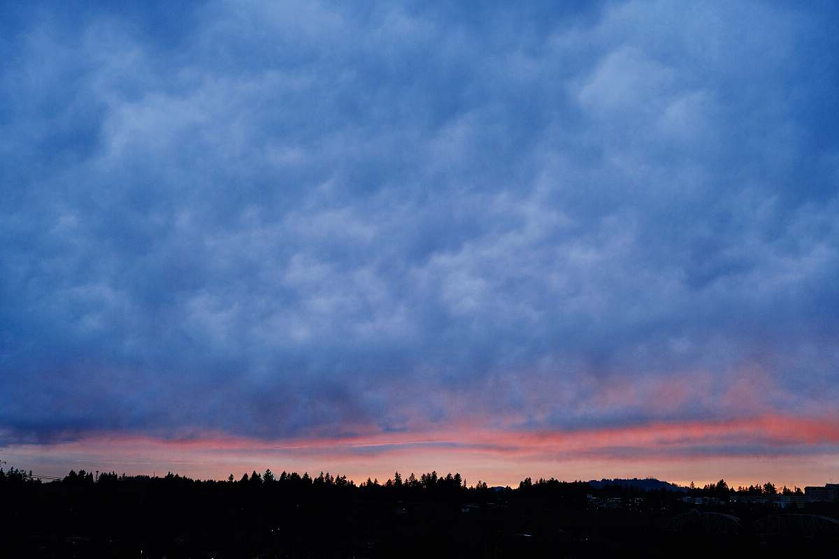 cloud white clouds over silhouette of trees lake oswego