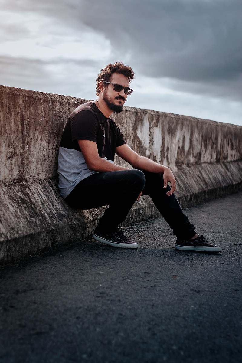 clothing man near wall footwear