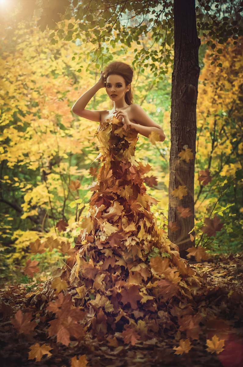 clothing woman standing surrounded by leaves fashion