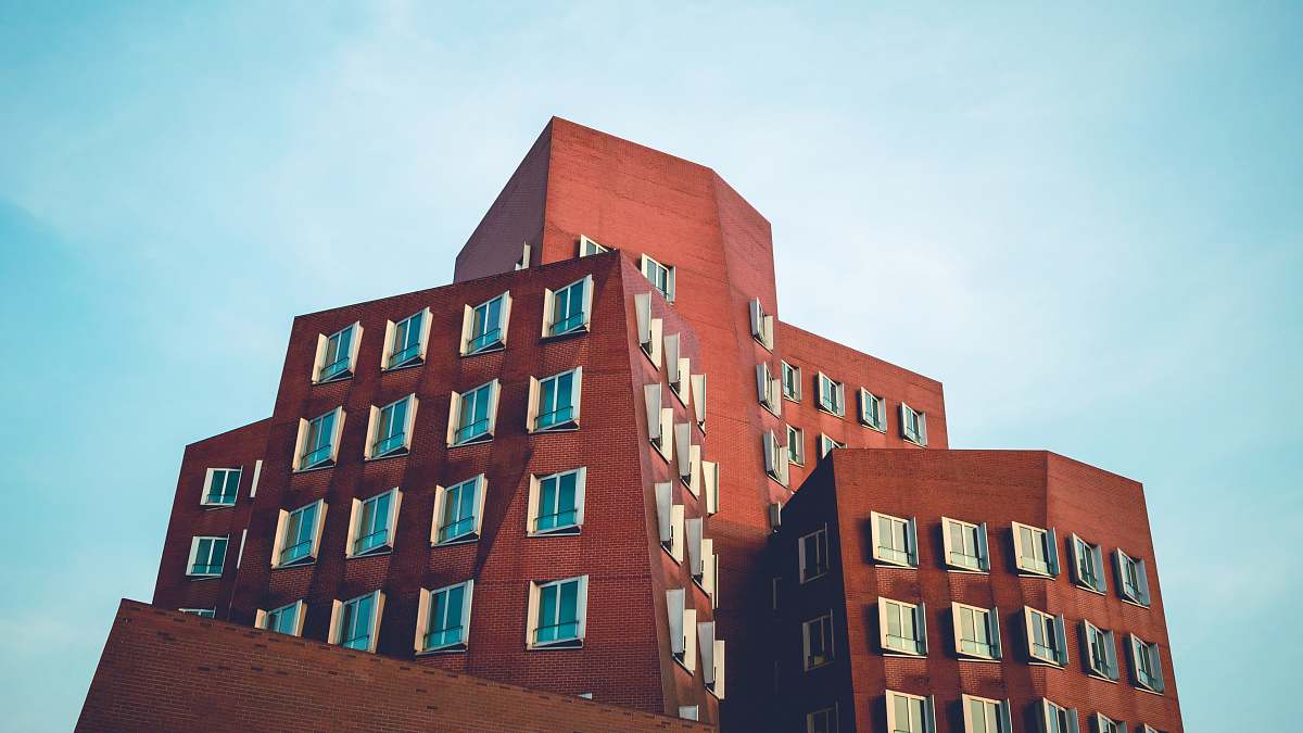 housing low angle photo of concrete building building