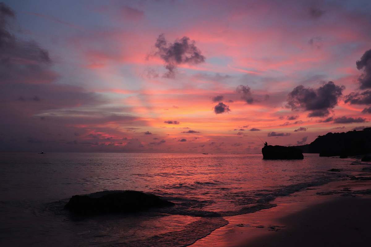sunset photo of seashore during golden hour beach