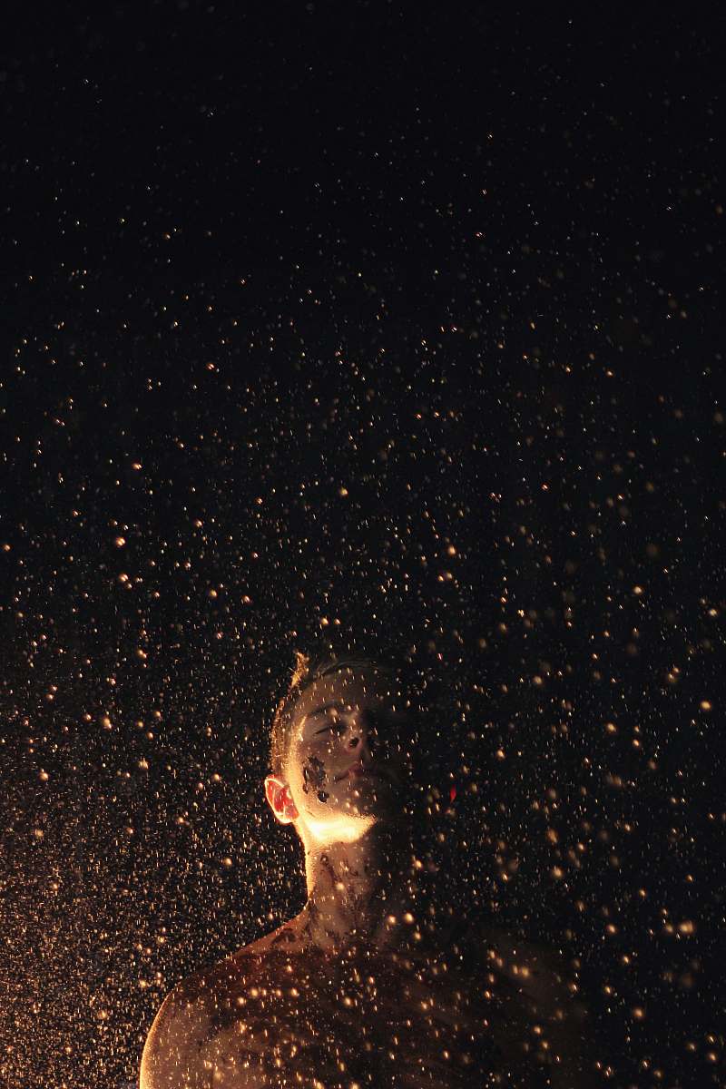 gold photo of man closing his eyes mud