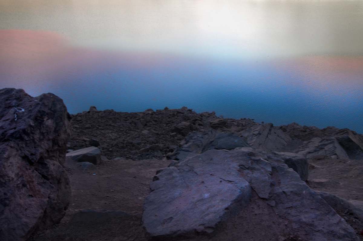 outdoors gray rocks under gray sky embalse el yeso