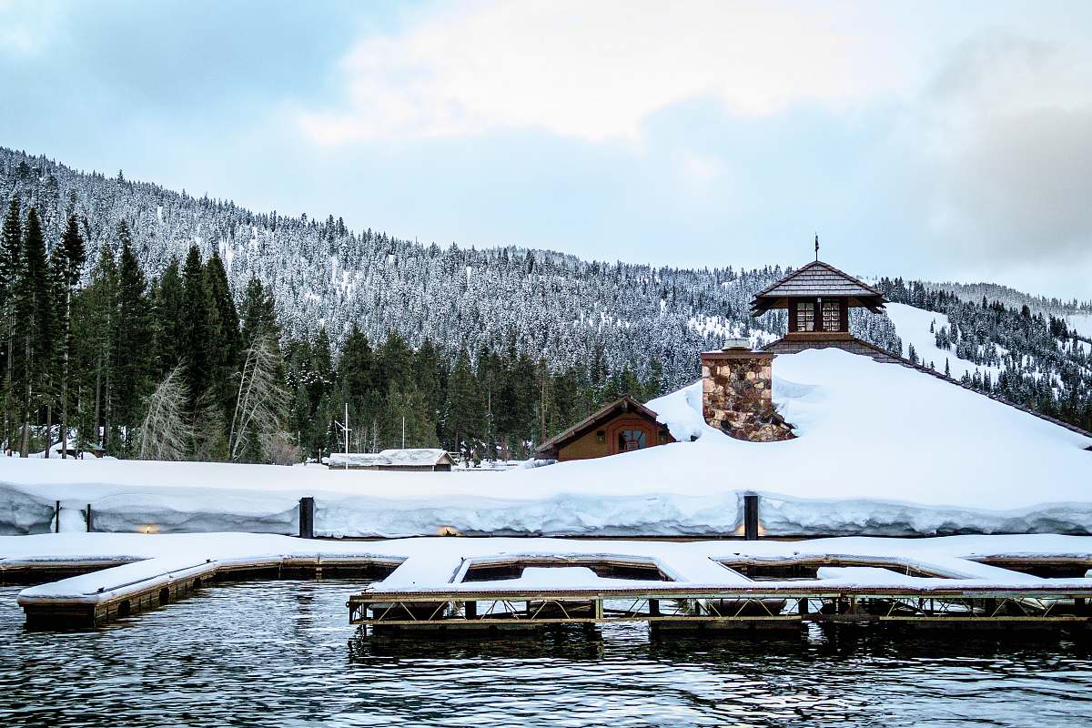 outdoors snow covered dock on the water water