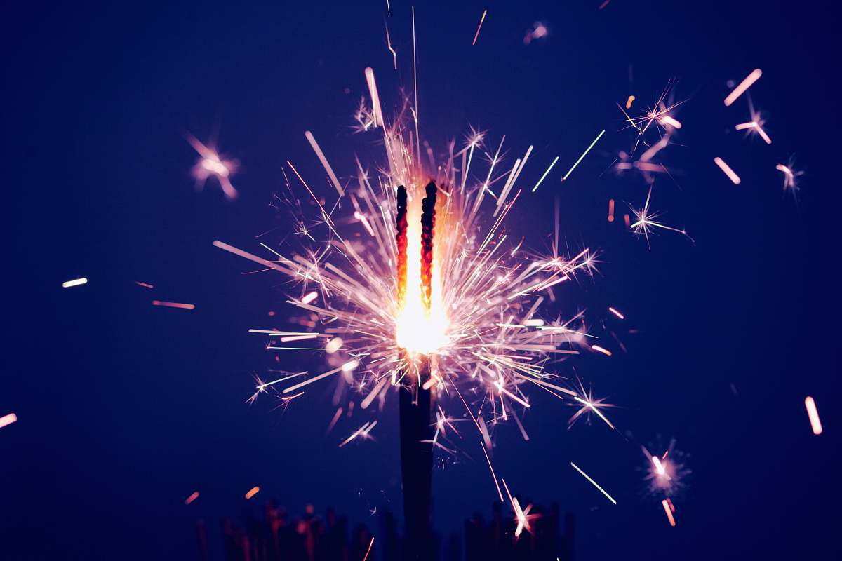 fireworks time-lapse photography of sparkler at night time night