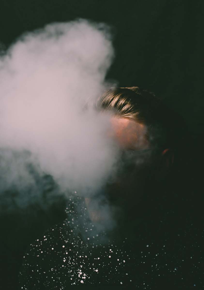 This captivating image features a man embodying a surreal concept, with a billowing cloud emerging from his mouth, symbolizing creativity and introspection. The scene evokes a sense of wonder and imagination, making it an ideal choice for artistic projects, editorial content related to mental health, or visual storytelling that explores the connection between humans and nature. Perfect for use in advertising campaigns or social media posts that seek to inspire and provoke thought.