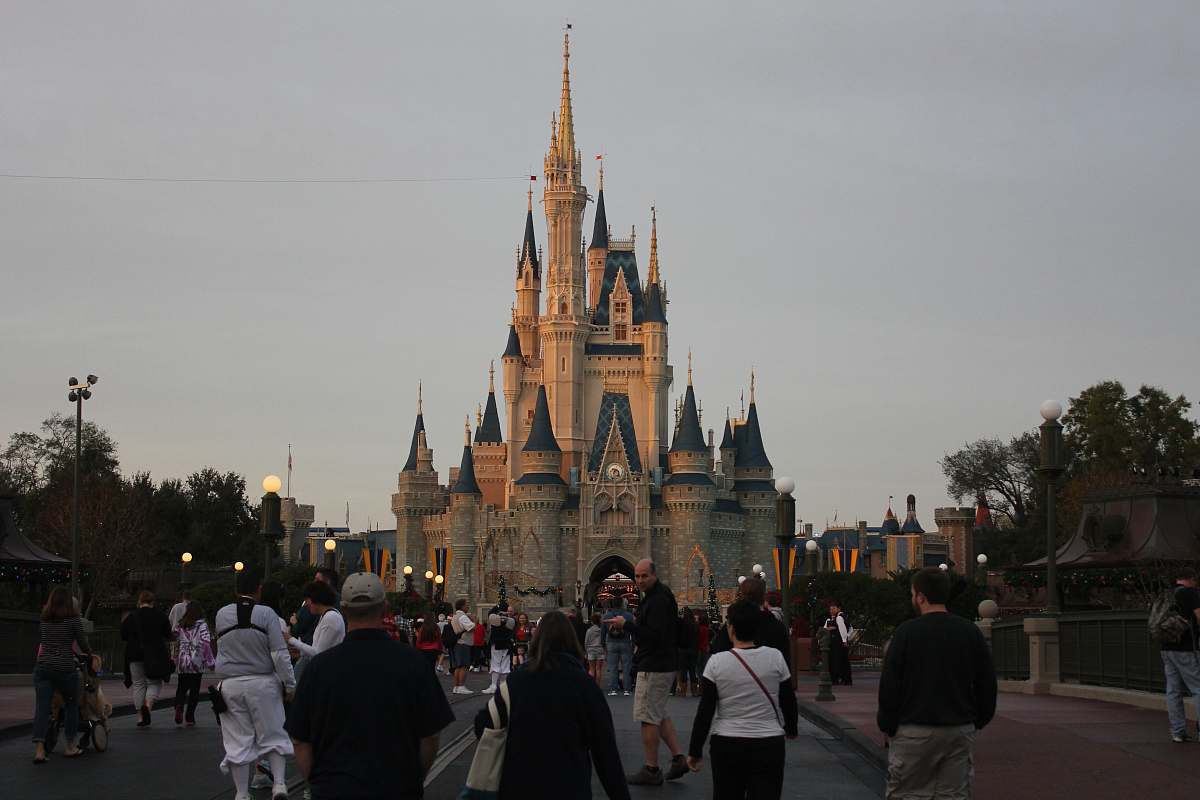 human people walking towards castle pedestrian