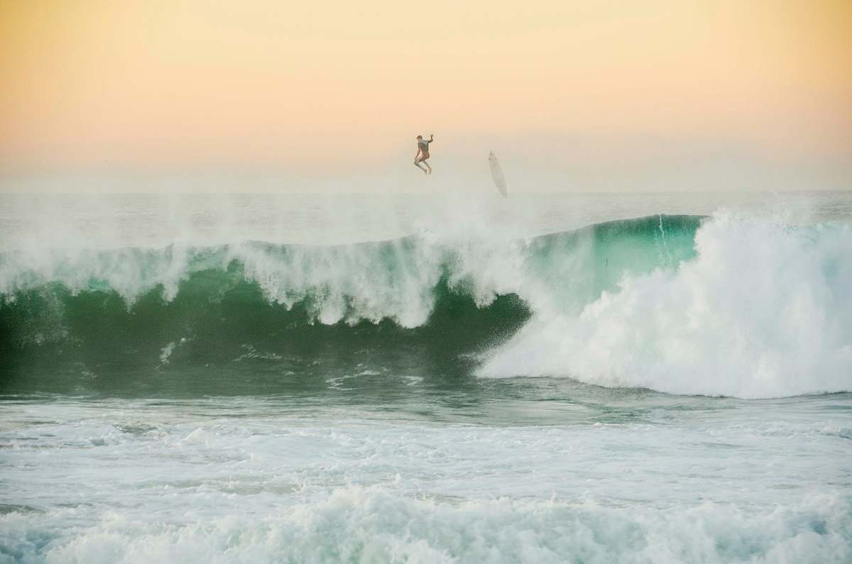 sea person surfing ocean