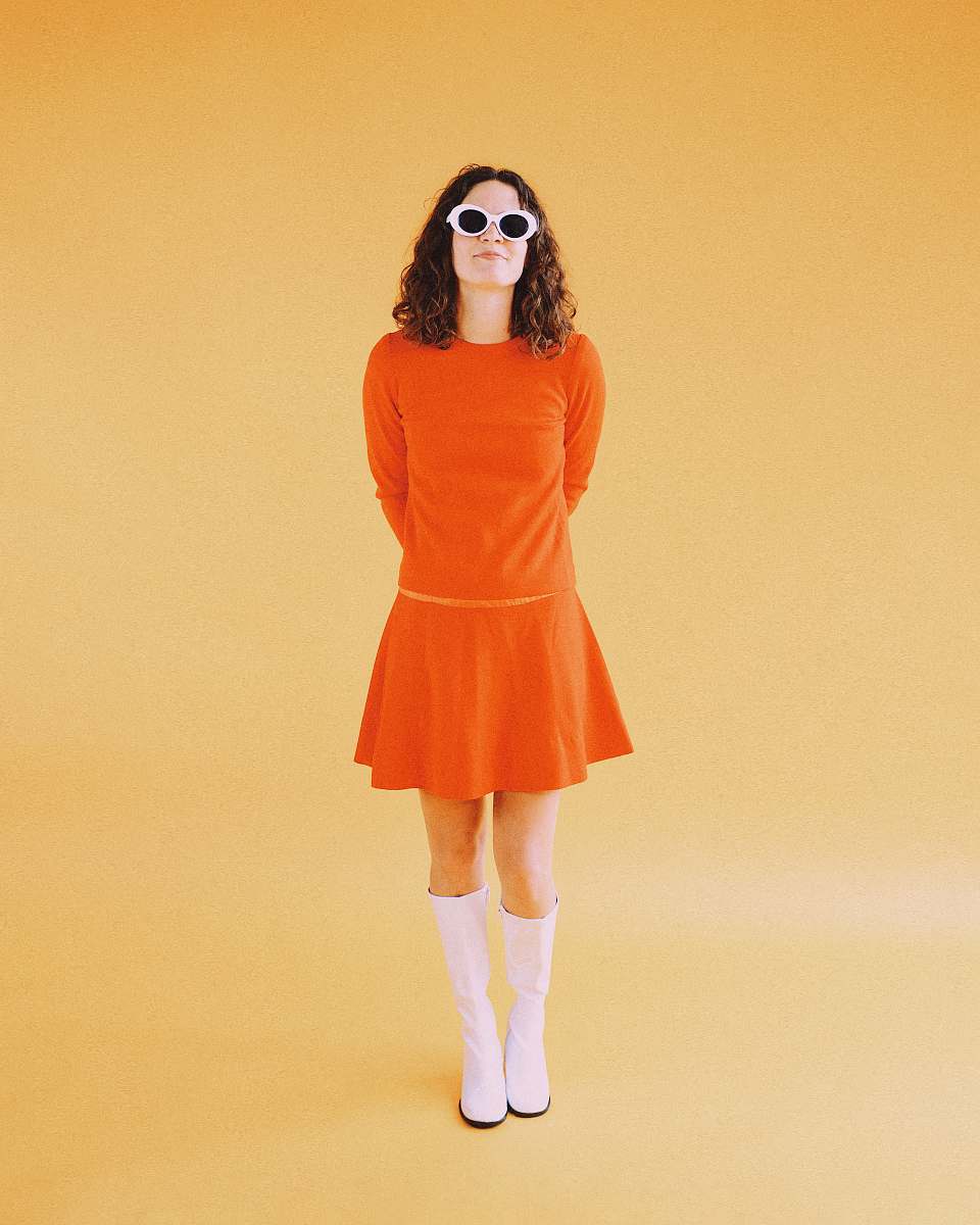 clothing woman wearing orange long-sleeved dress dress