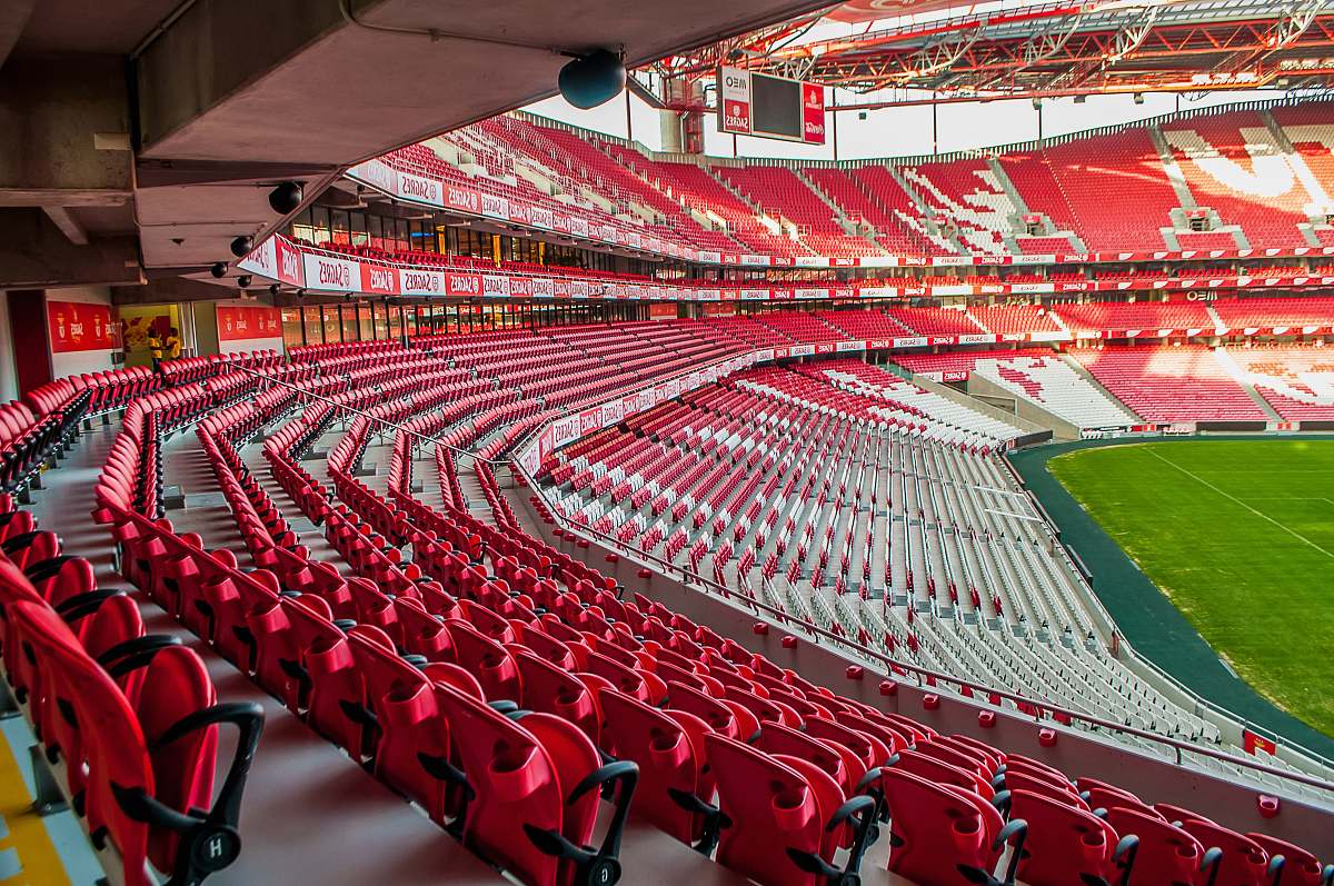 hall white and red stadium photo at daytime indoors