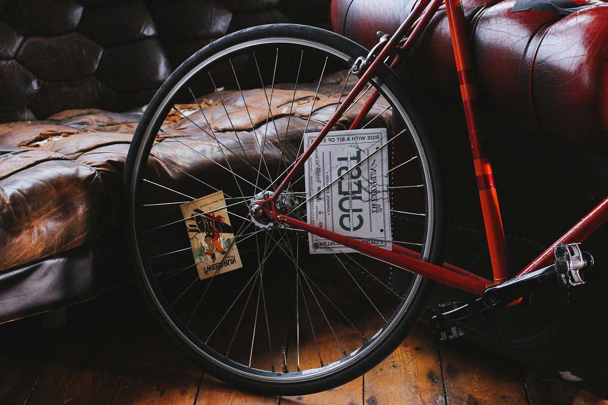 couch red bike beside sofa bike