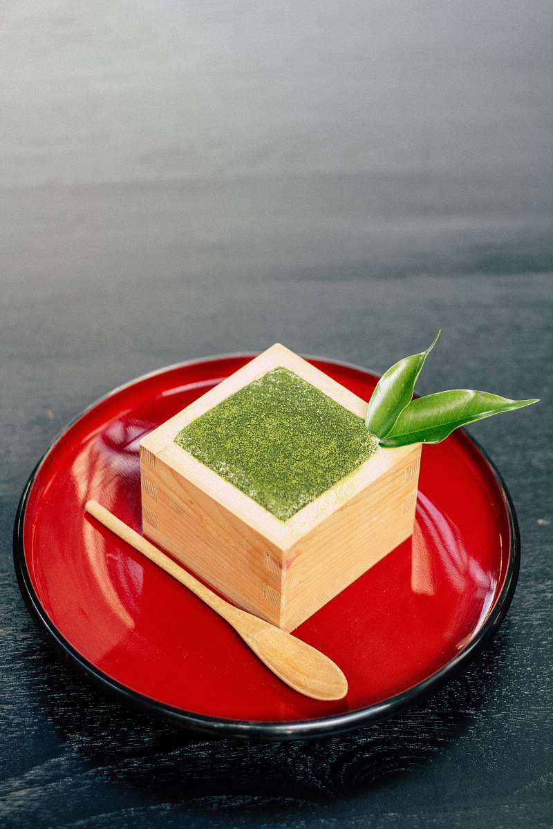 vessel brown cube on red plate watercraft