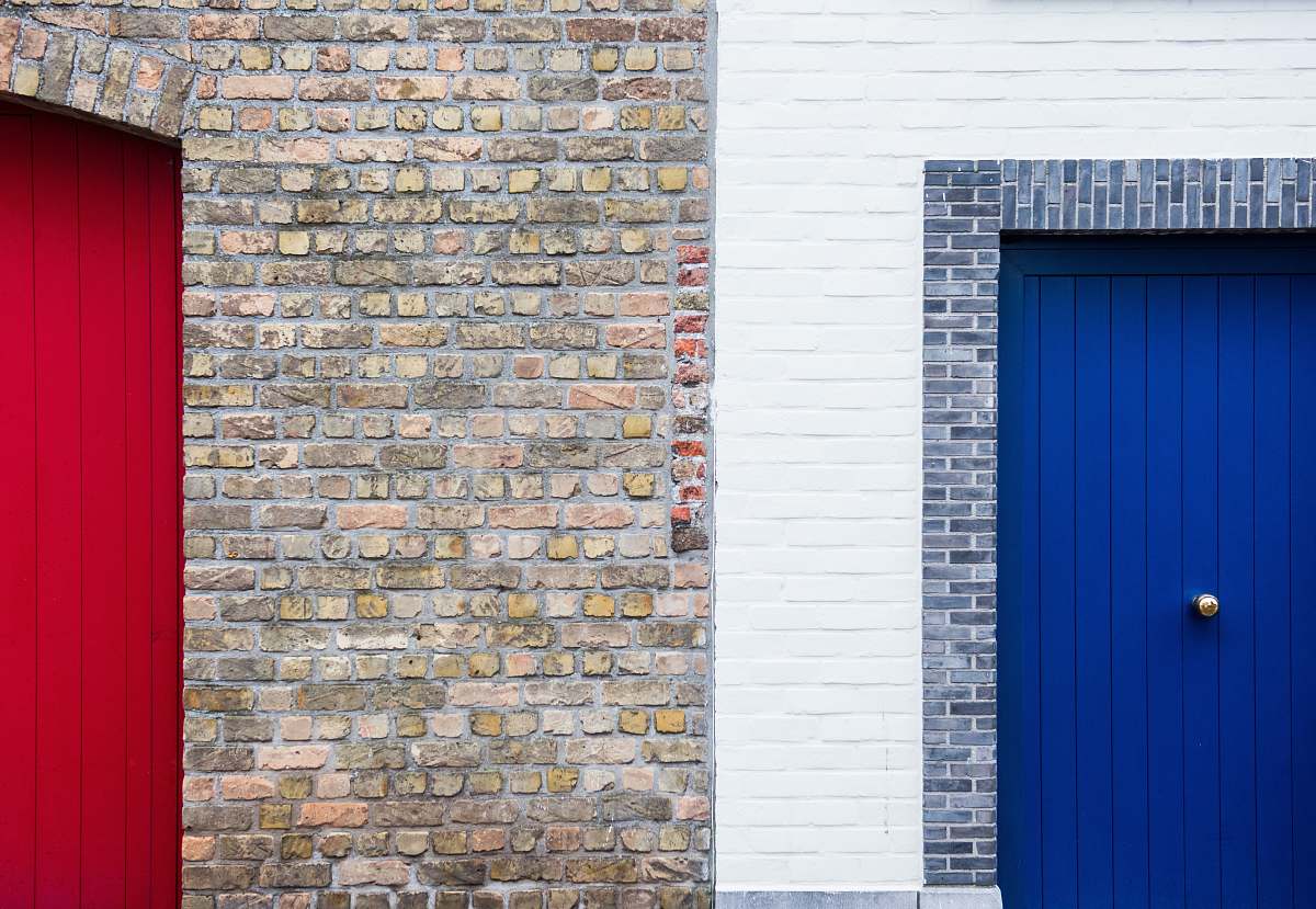 door blue wooden door in brick wall wall