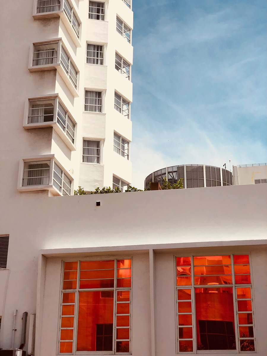 balcony bottom view of white paint building housing