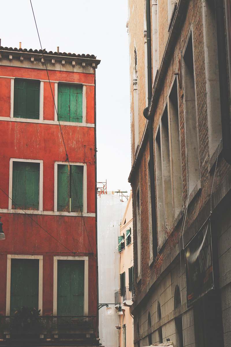 brick red concrete building flora