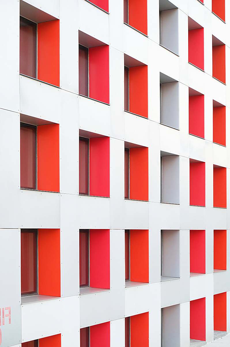 banister white and red concrete building handrail