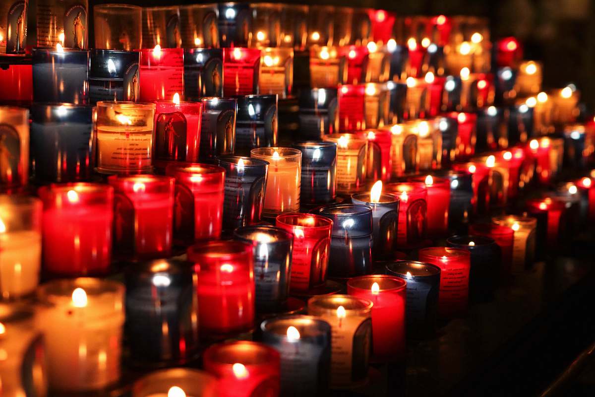 red pile of candles flame