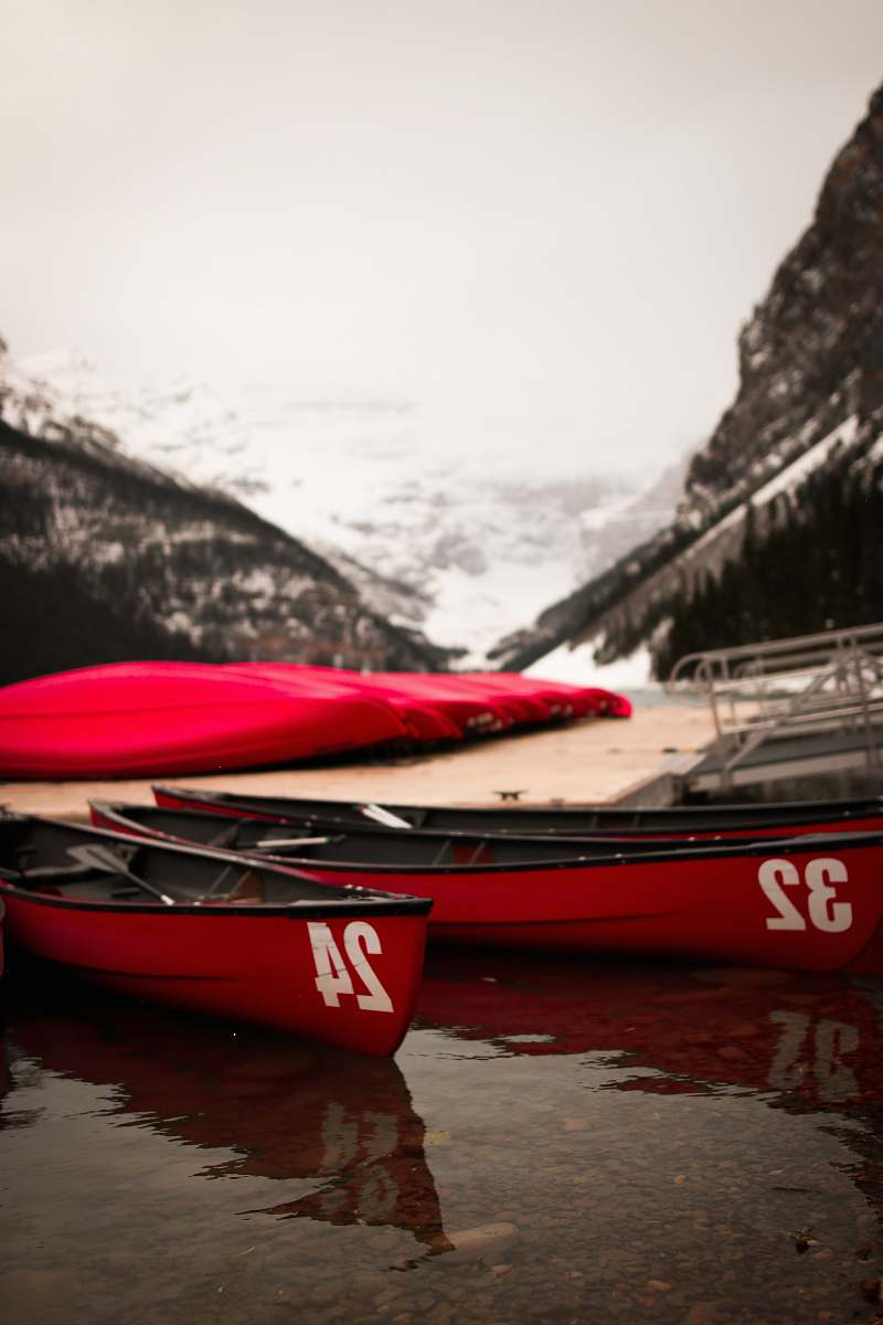 watercraft two red row boats boat
