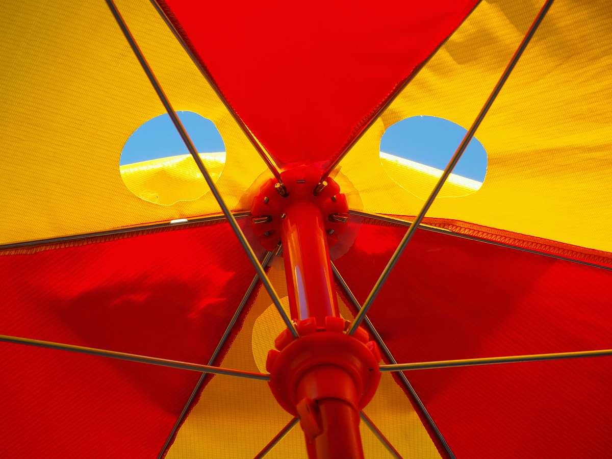 umbrella red and white parasol umbrella blue sky red yellow food