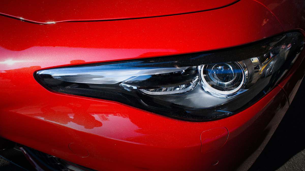 automobile closeup view of car clear headlight transportation