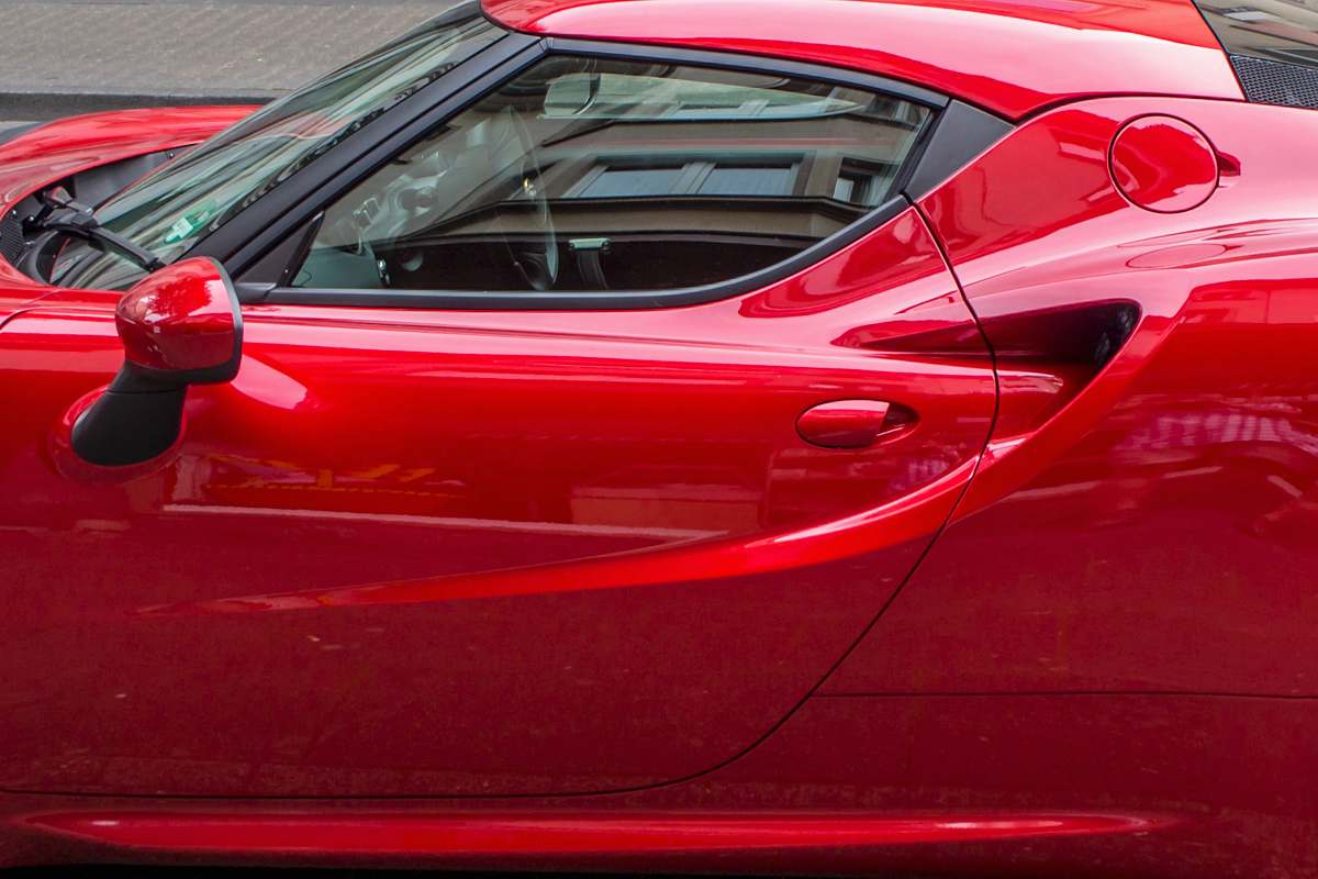 vehicle red coupe during daytime automobile