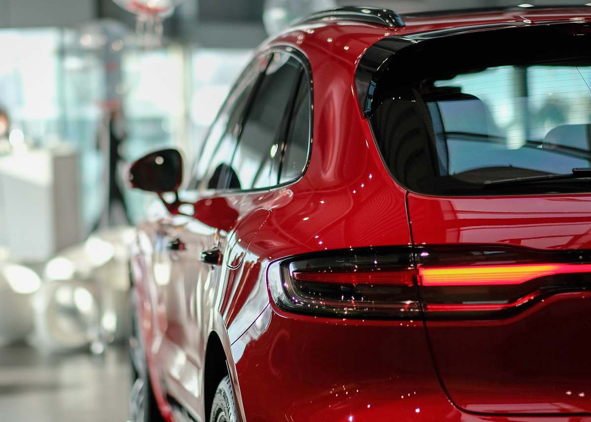 machine red five door vehicle spoke